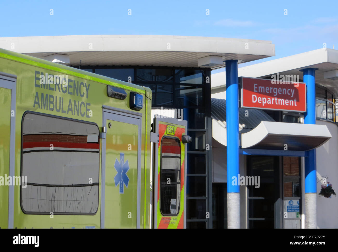 Ambulance vehicle parked outside of hospital emergency department Stock Photo