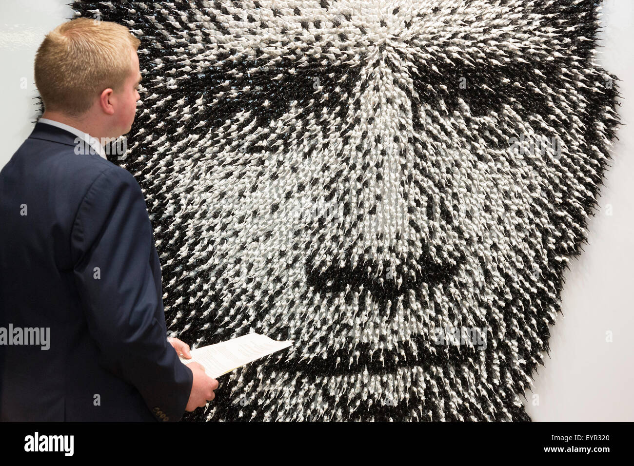 London, UK. 3 August 2015. Barack Obama portrait 'Shoot to Kill' by Joe Black, made of 11,000 toy soldiers. On 10 September 2015 Christie's South Kensington will hold the third annual 'Out of the Ordinary' auction, celebrating all things extraordiary and unusual - from a massive T-Rex to a portrait of Barack Obama made of toys. The preview marks the start of a free five-week summer exhibition, opening to the public on 3 August 2015. Photo: ukartpics/Alamy Live News Stock Photo