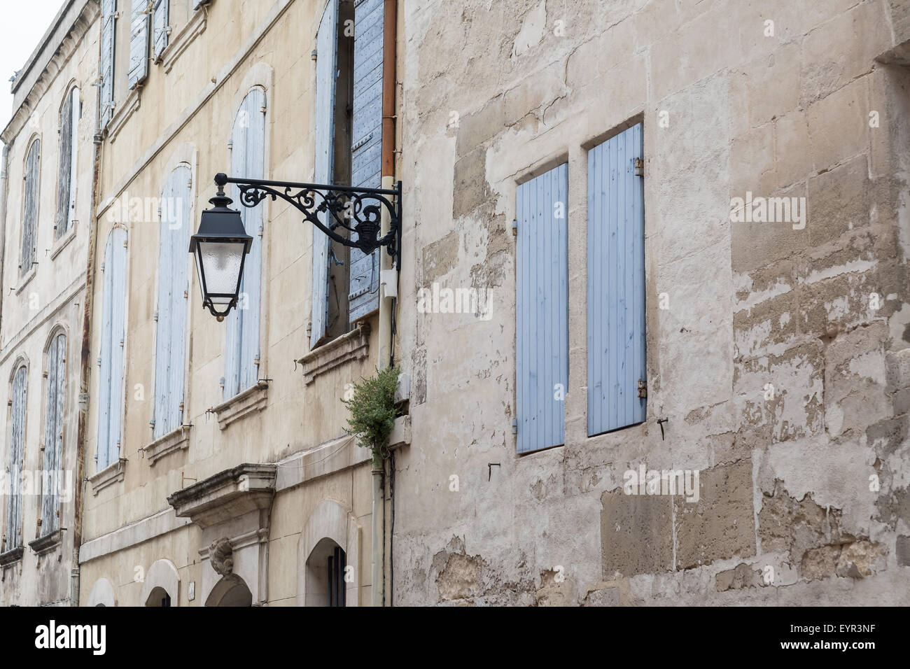 Street in Arles France with old lamp post Stock Photo