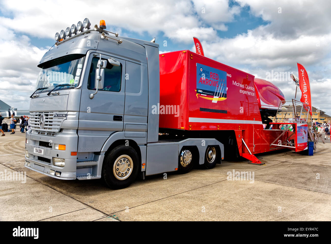 A Mercedes- Benz articulated truck with a Royal Air Force Red Arrows Display Team simulator ride at RNAS Yeovilton Air Day 2015. Stock Photo