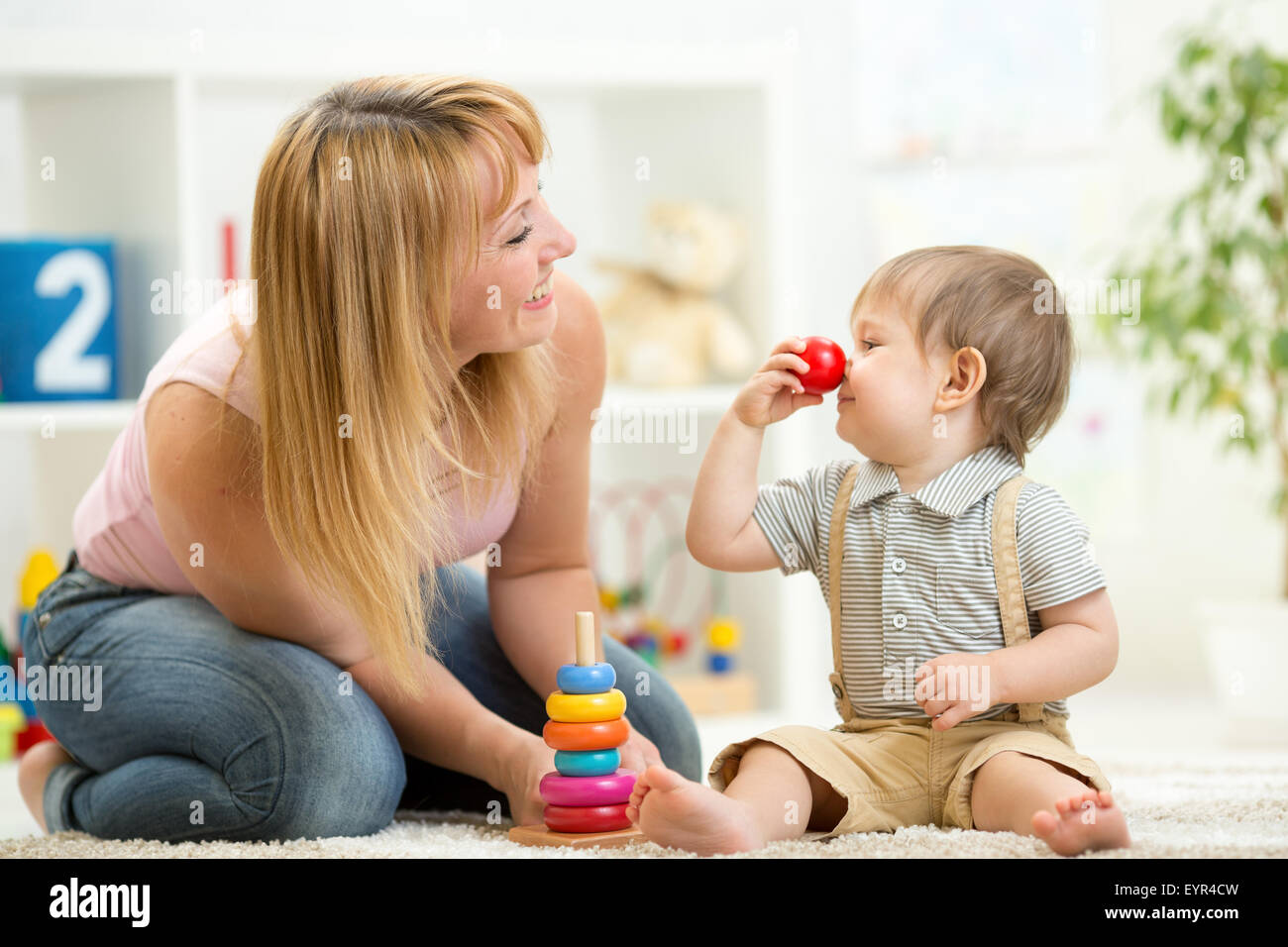 mother with child son play having fun pastime Stock Photo