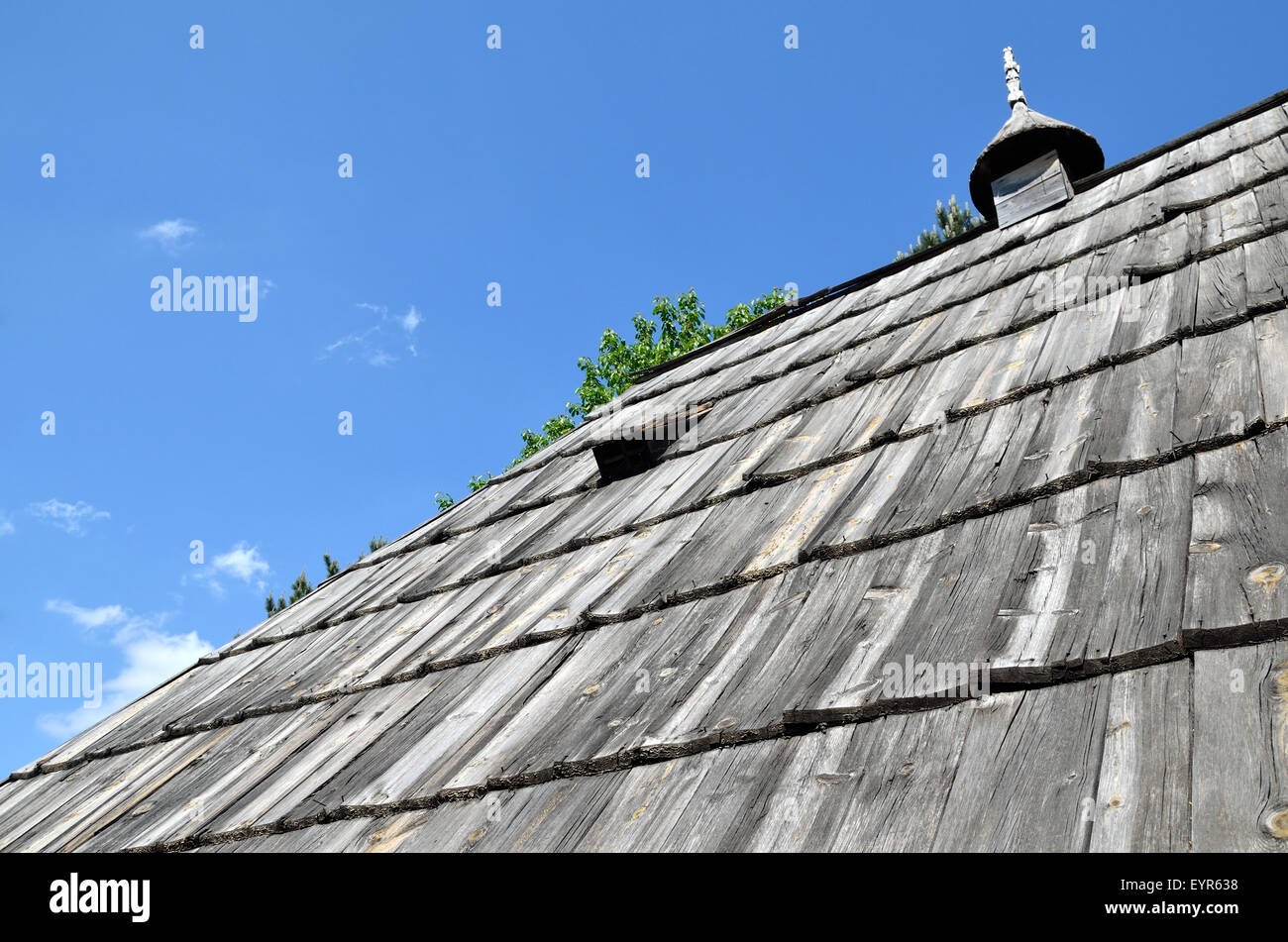 Wooden roof of traditional mountain house and blue sky Stock Photo - Alamy