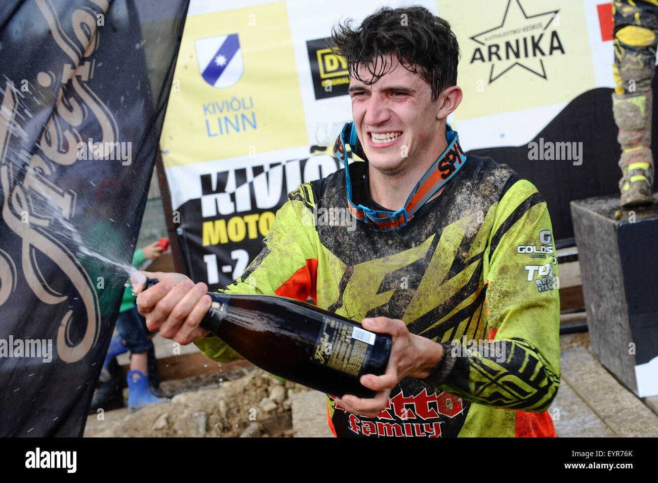 North-Eastern Estonia. 2nd Aug, 2015. 2nd Aug, 2015. The leader of ITP Quadrocross European Championship and the winner of 5th round in Kivioli Latvian racer Edgars Mengelis celebrates during the flower ceremony at the 5th round of championship, which was held at Kivioli Motocross Track in North-Eastern Estonia, on Aug. 2, 2015. Credit:  Sergei Stepanov/Xinhua/Alamy Live News Stock Photo