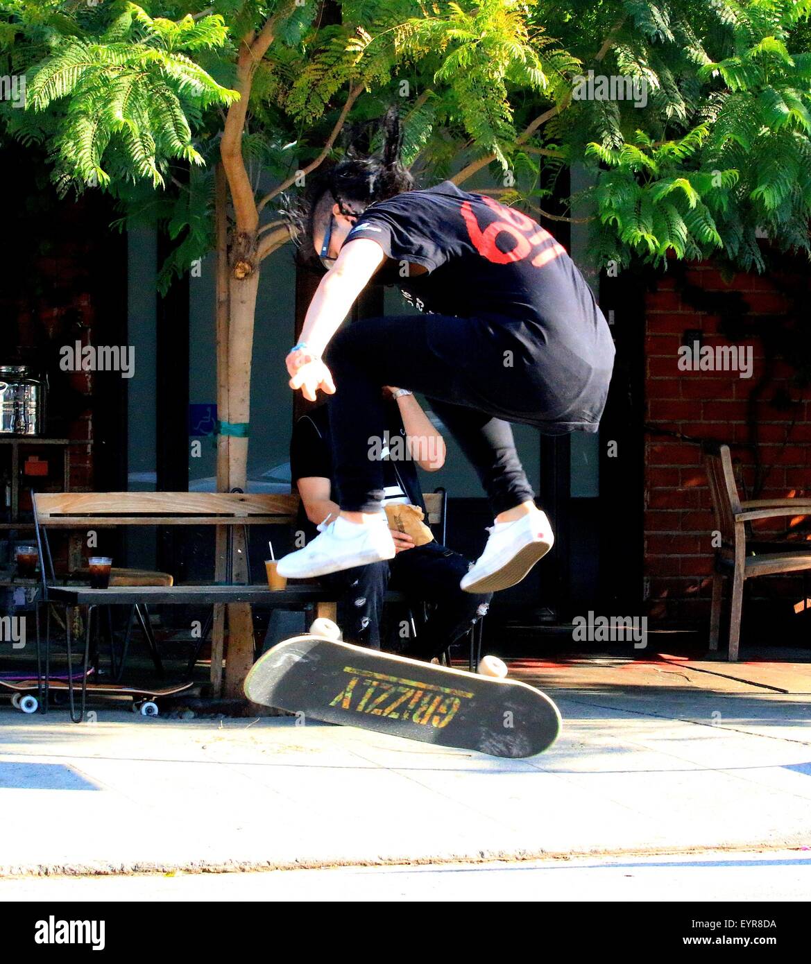 Dj Skrillex sighted doing skateboarding tricks in Downtown Los Angeles  Featuring: Dj Skrillex Where: Los Angeles, California, United States When:  01 Jun 2015 C Stock Photo - Alamy