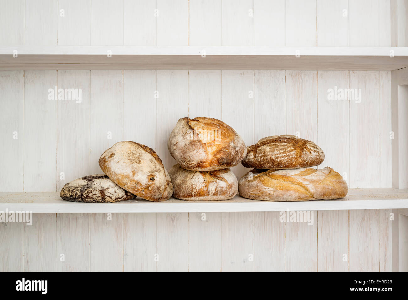 Various traditionally made sourdough breads in a bakery, Devon UK Stock