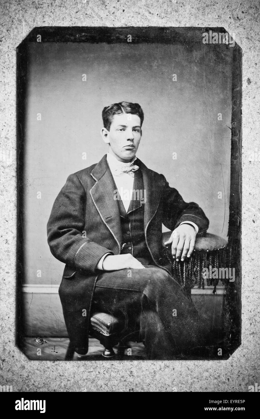 Tintype photo of man sitting, late 1800s Tintype photo of man sitting, late 1800s