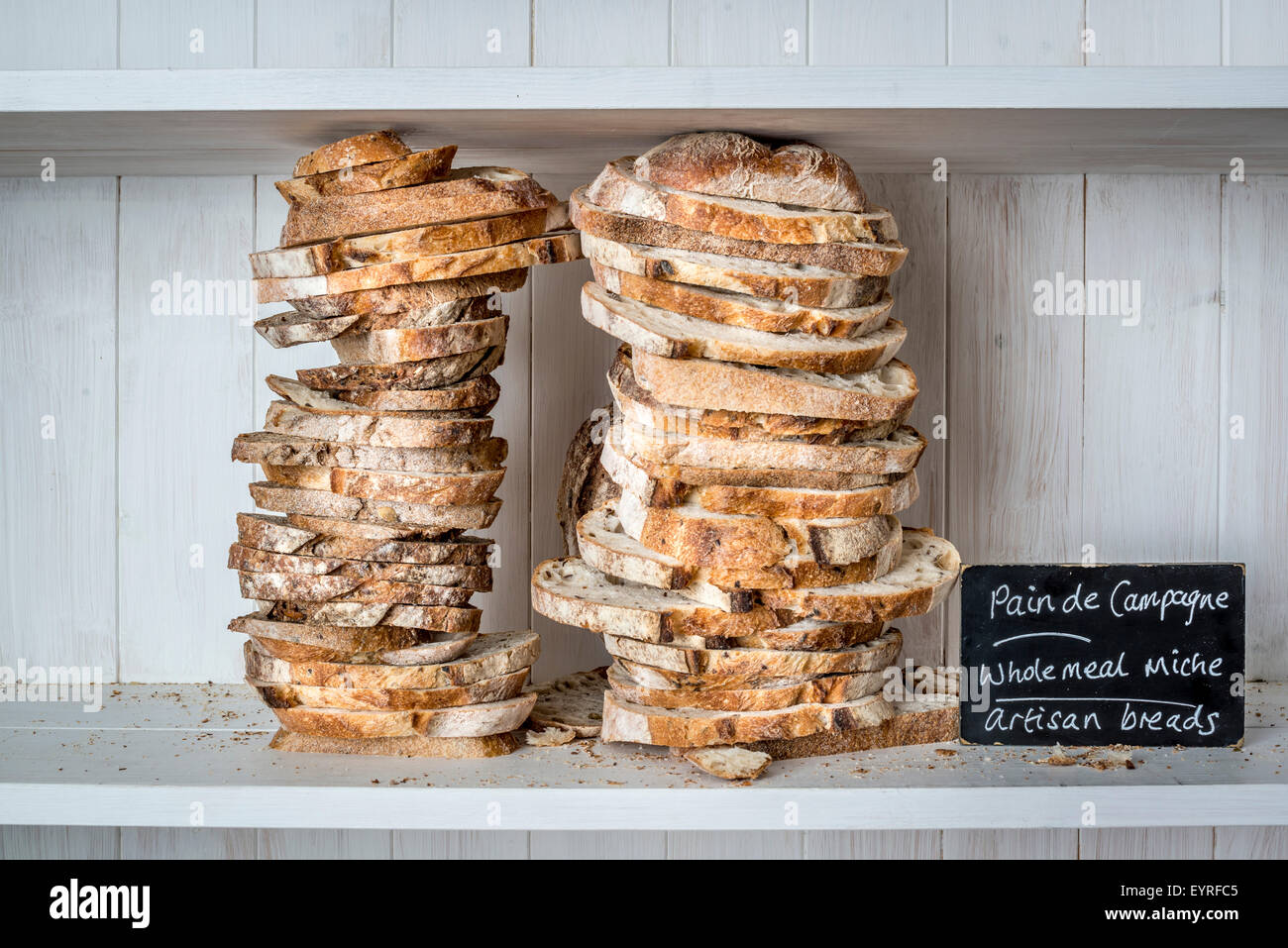 Various traditionally made sourdough breads in a bakery, Devon UK Stock Photo