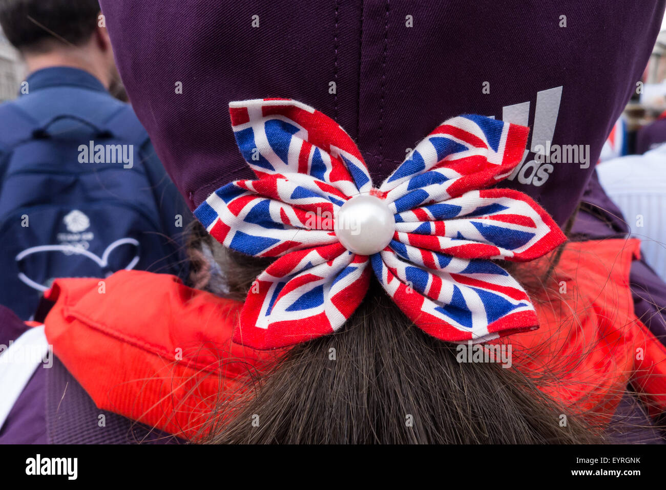 Trafalgar Square, London, Engand. A British supporter with Union Jack bow in her hair, in the crowds. Stock Photo