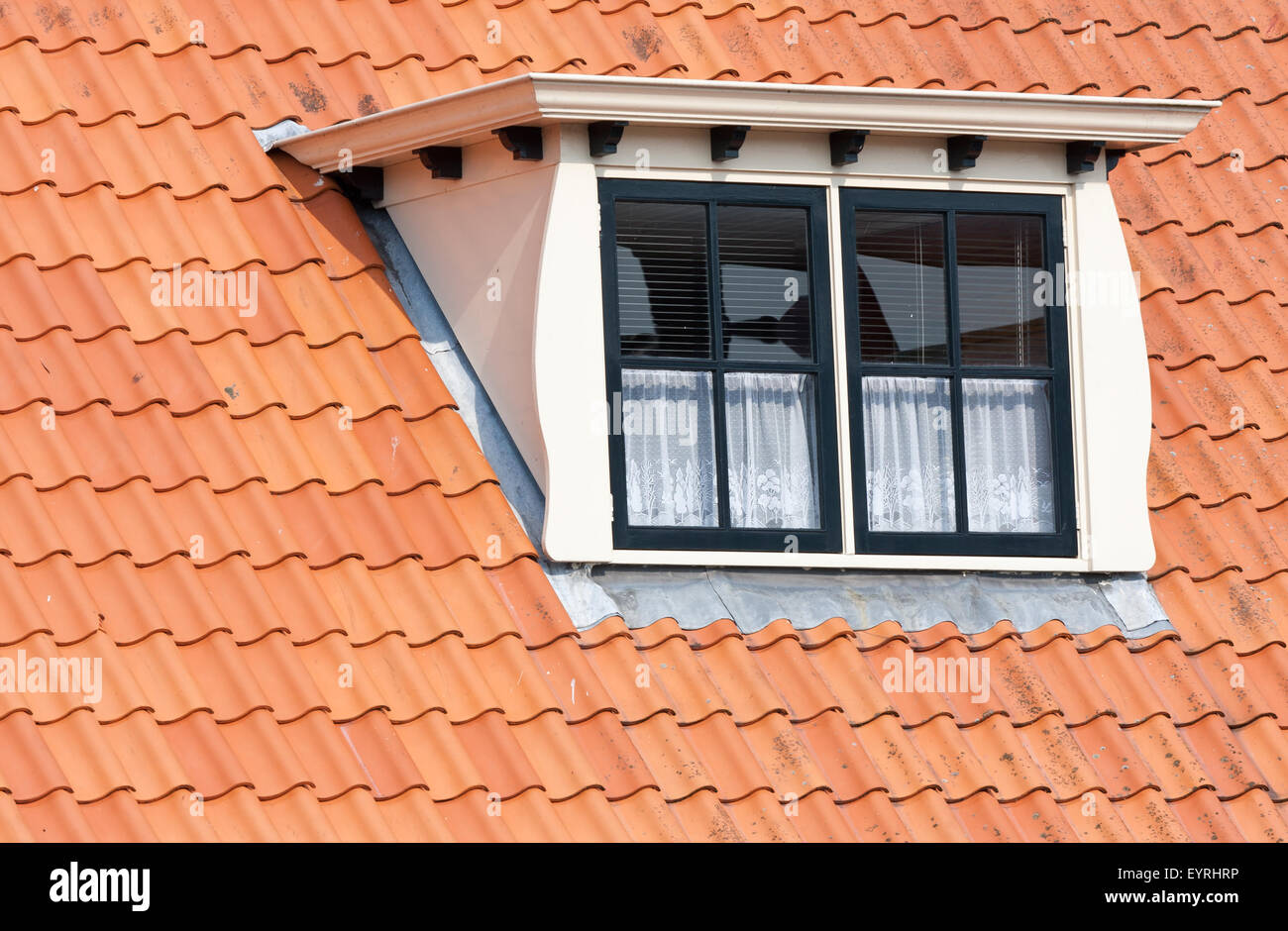 Typical Dutch roof with dormer and squared windows Stock Photo
