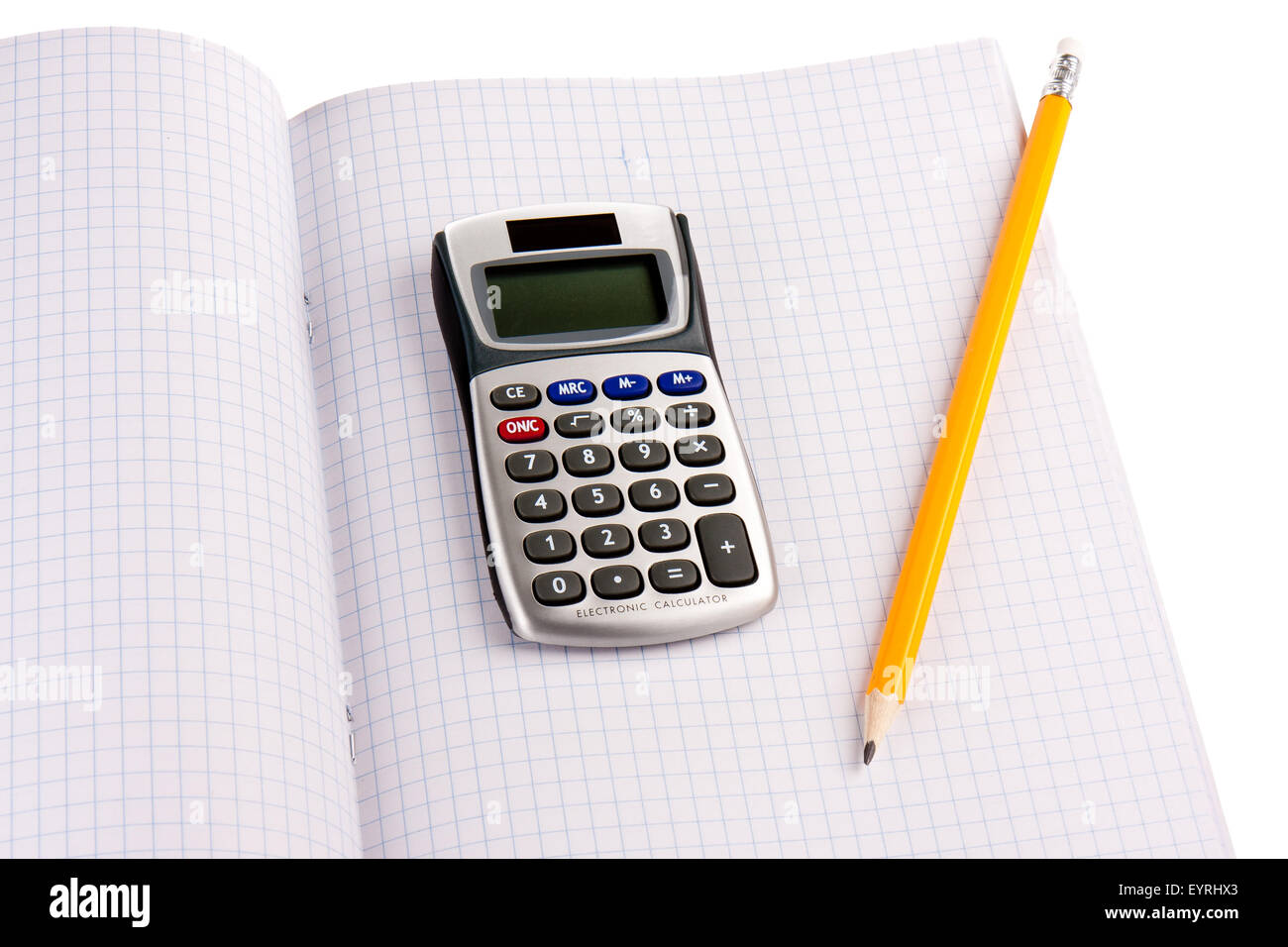 Calculator with pencil on squared paper isolated over white Stock Photo