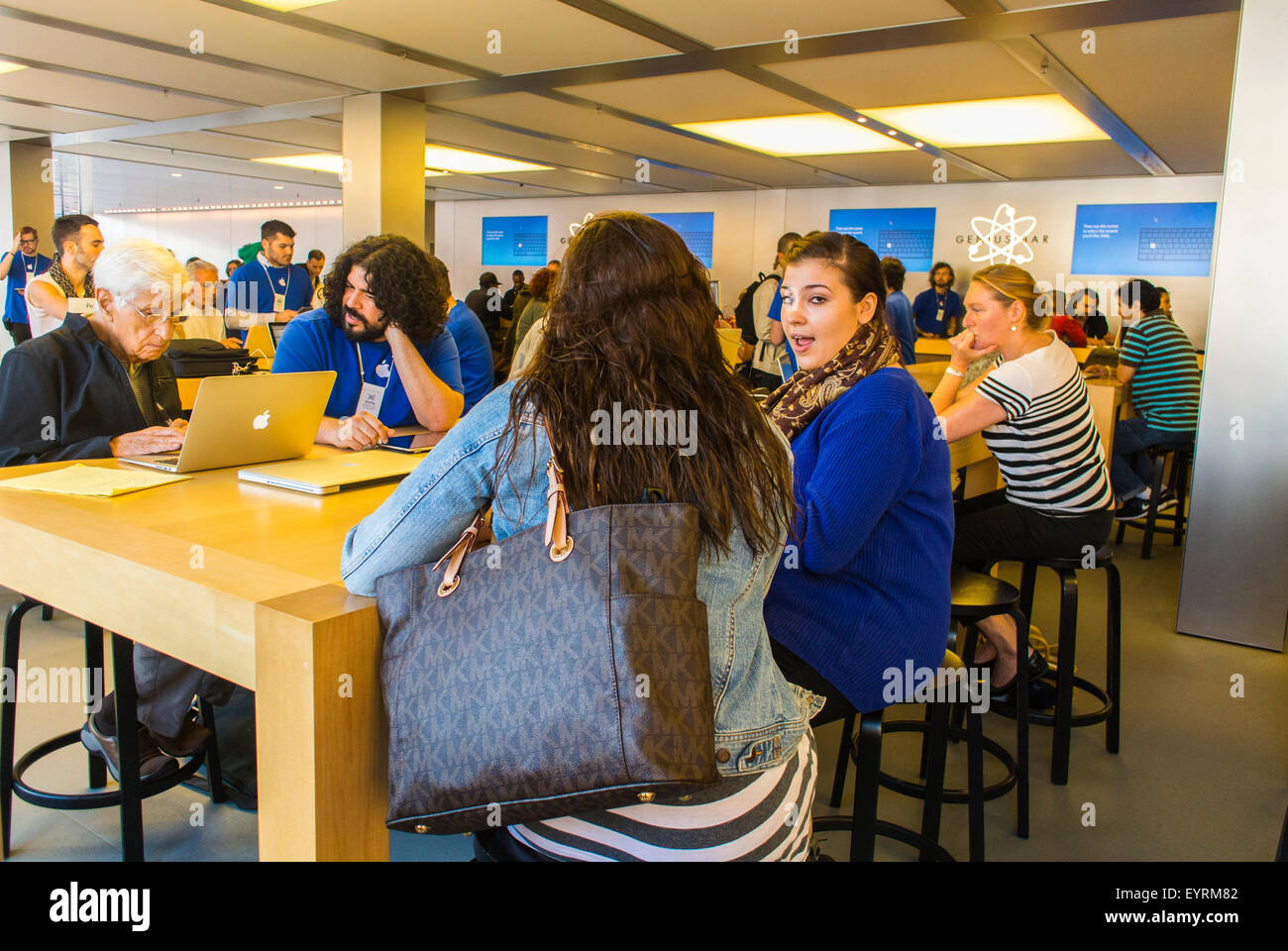 New York City, USA, Apple Store in Manhattan, teenagers jobs, People inside Showroom, buying tech products Stock Photo