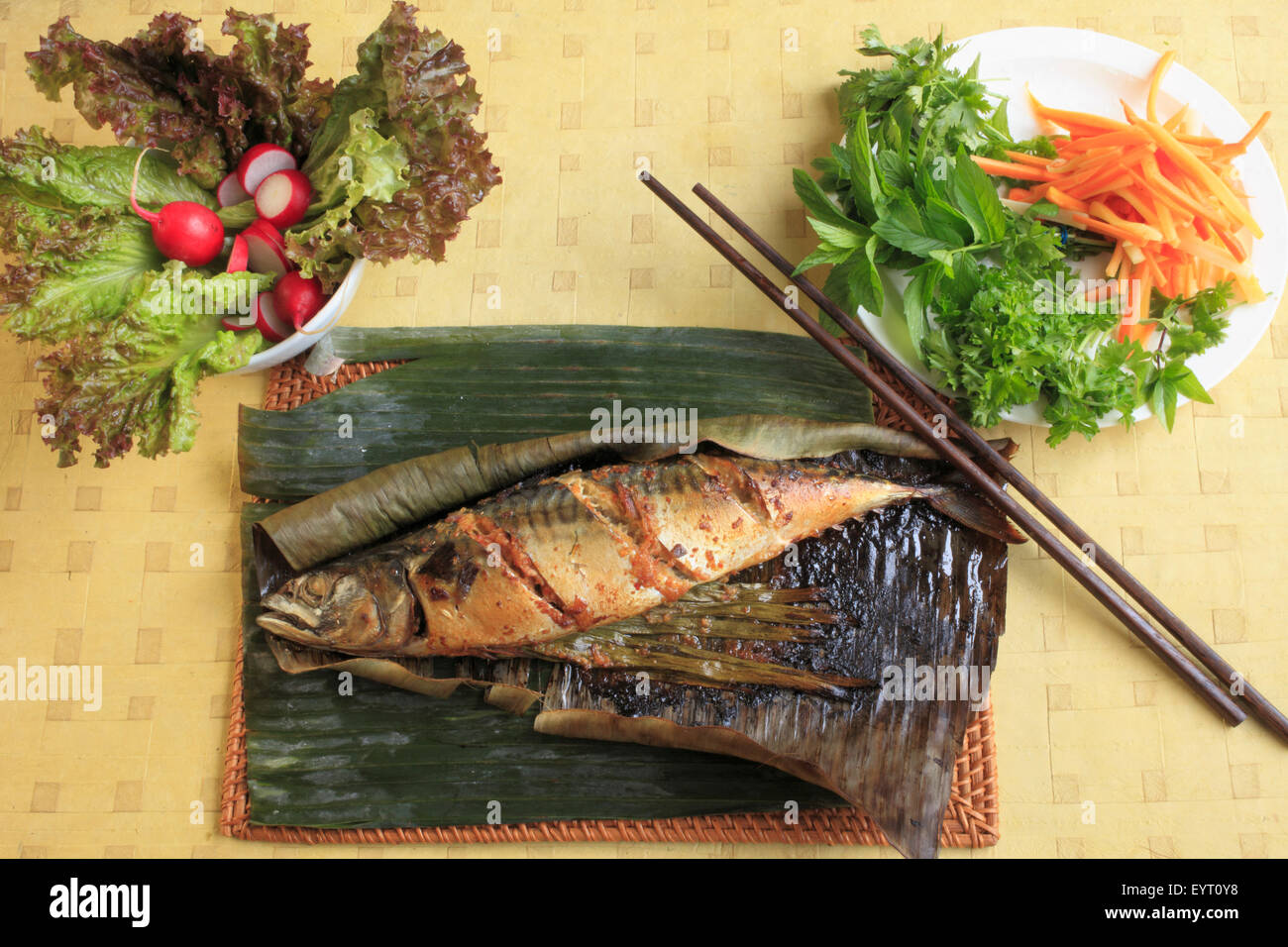Vietnamese roasted fish, mackerel, banana leaf Stock Photo Alamy