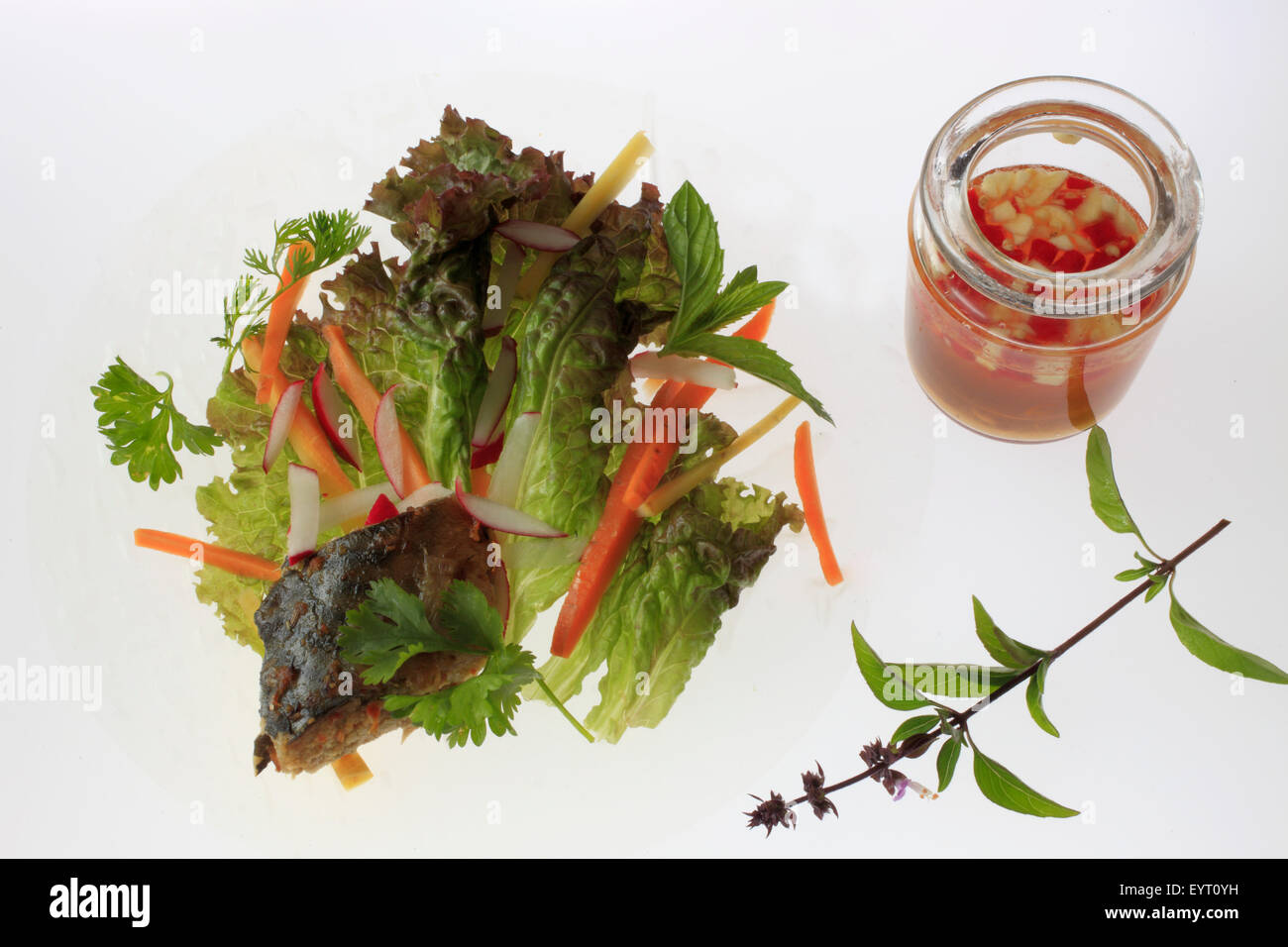 Vietnamese roasted fish, salad, fish sauce Stock Photo Alamy