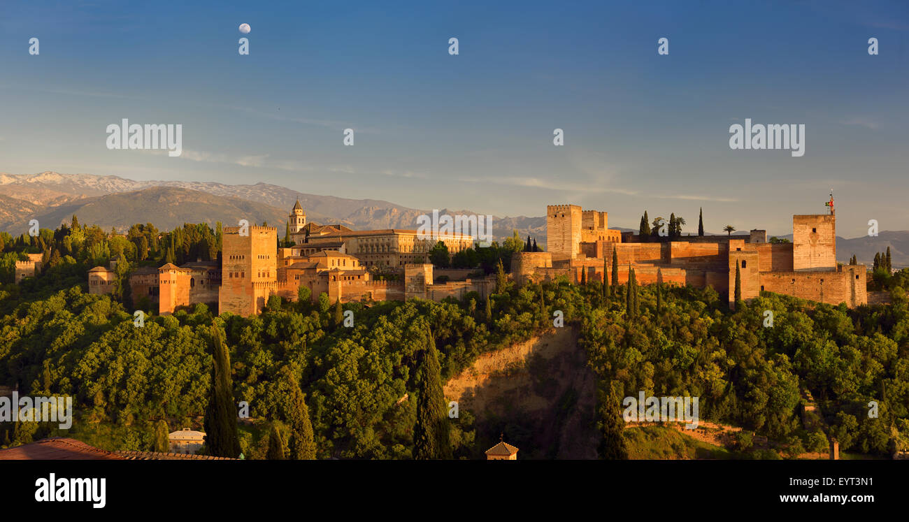 Panorama of hilltop Alhambra Palace fortress complex at sundown Granada Stock Photo
