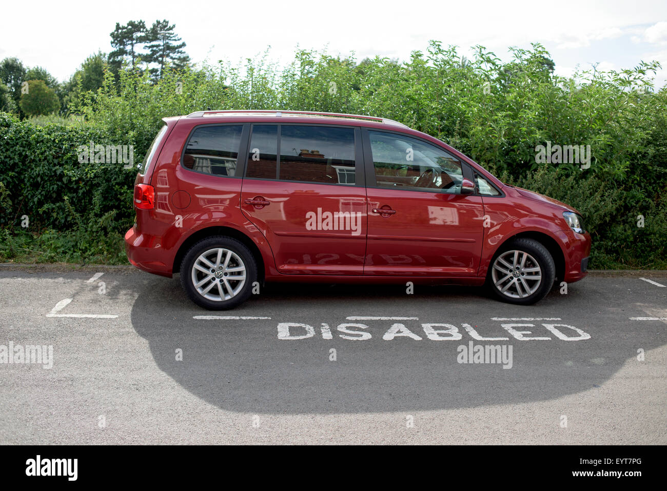 Car Parked In Bay For Disabled Driver Stock Photo