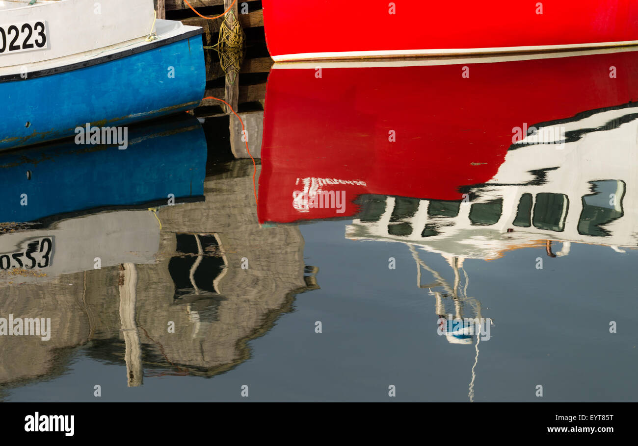 Boats and reflections at Peggy's Cove, Nova Scotia, Canada - Stock Image