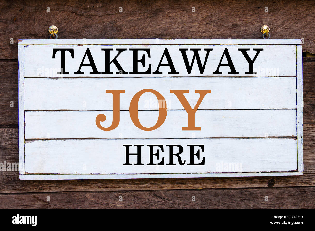 Takeaway Joy Here Inspirational message written on vintage wooden board. Motivation concept image Stock Photo