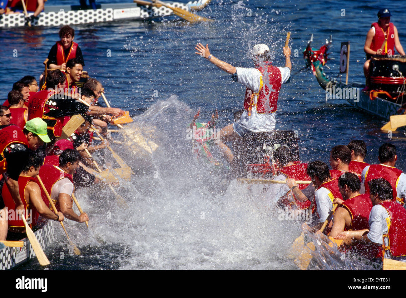 Dragon Boat Race in False Creek, at Alcan Dragon Boat Festival, Vancouver, British Columbia, Canada - Winner's Victory Splash Stock Photo
