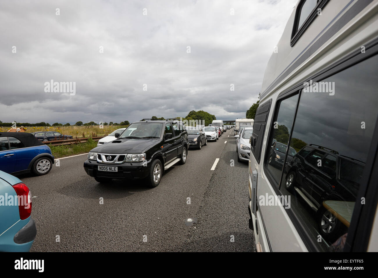 cars bumper to bumper on UK a55 north wales expressway at the start of the summer holidays Stock Photo