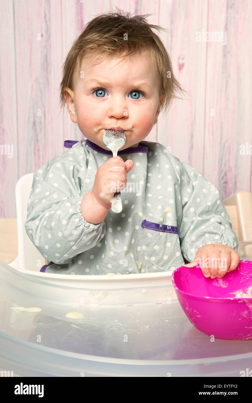 Baby, 6-12 months, mash, food, spoon, supplementary food, high-level chair, studio, portrait, Stock Photo