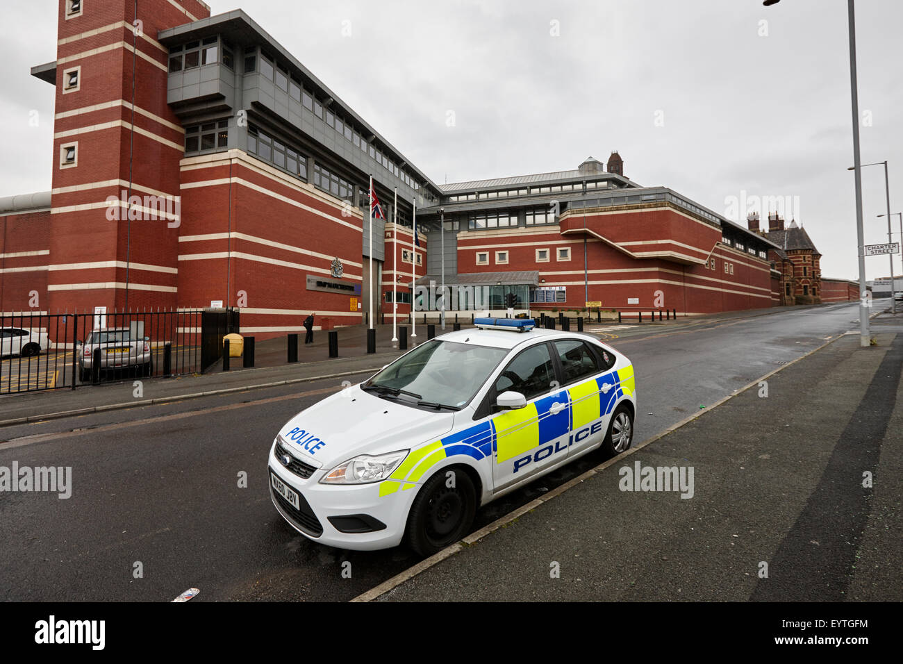 police car parked outside strangeways hmp prison Manchester England UK hmp manchester Stock Photo