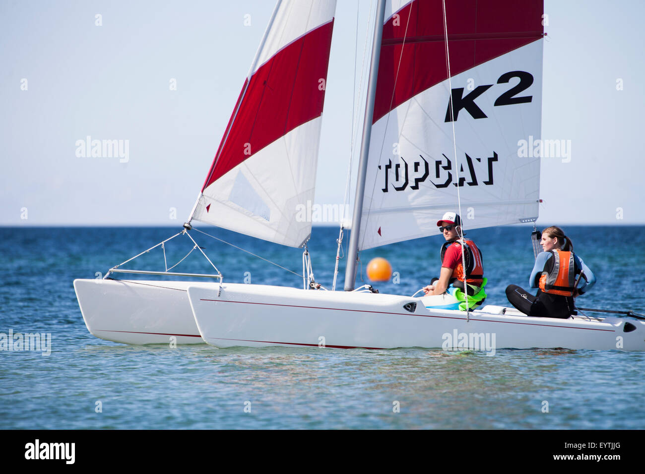Sail lessons on the catamaran Stock Photo Alamy