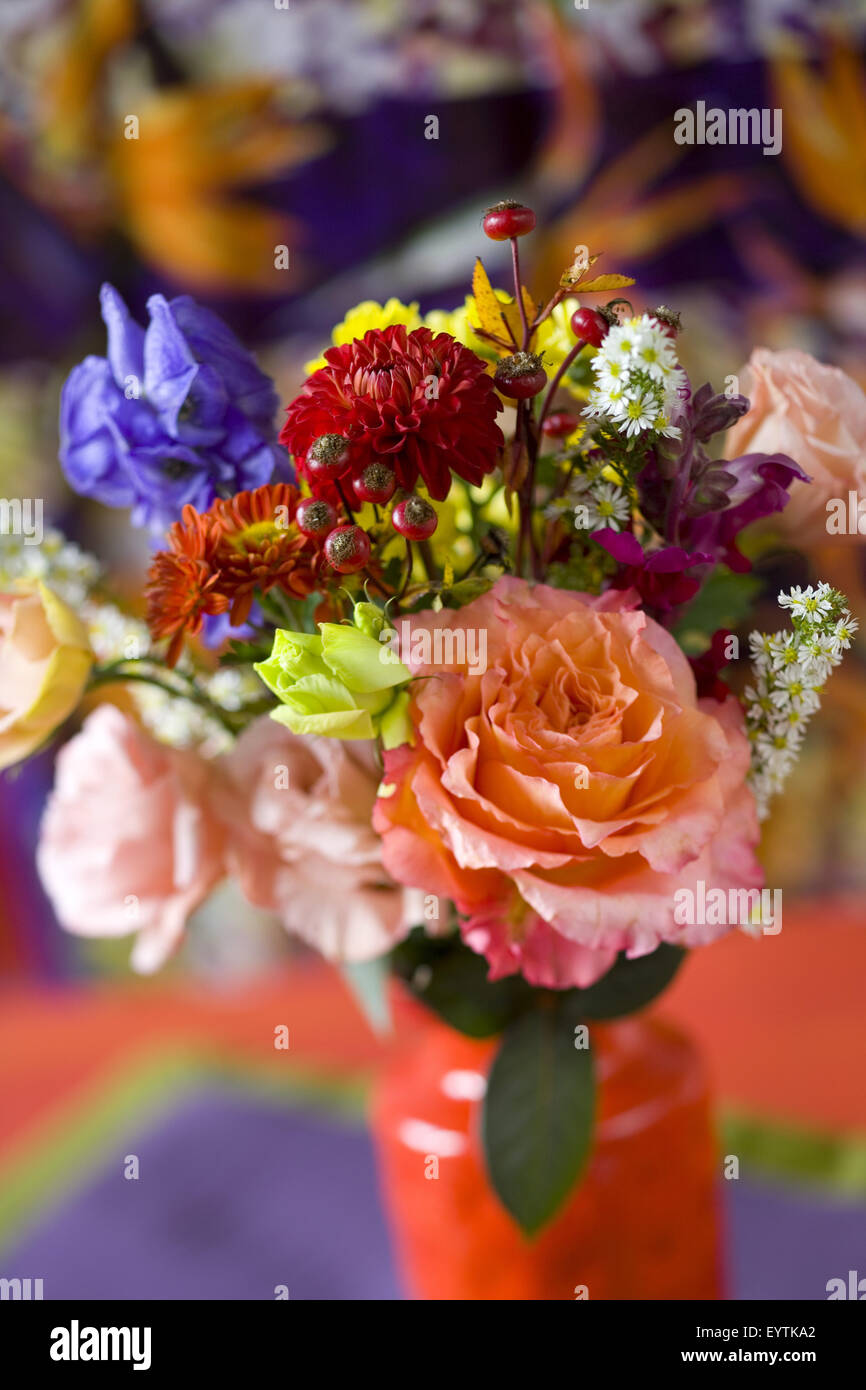 Coloured bouquet in red vase Stock Photo Alamy