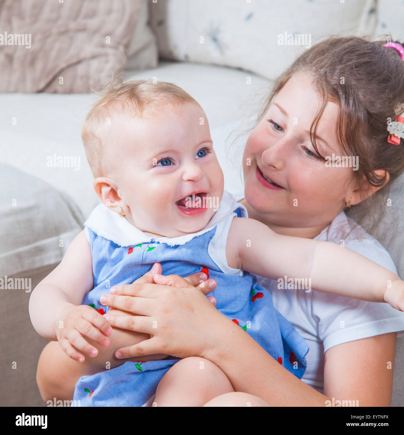 Big Sister Holding Her 1 Year Old Baby Sister Stock Photo Alamy big-sister-holding-her-1-year-old-baby-sister-stock-photo-alamy