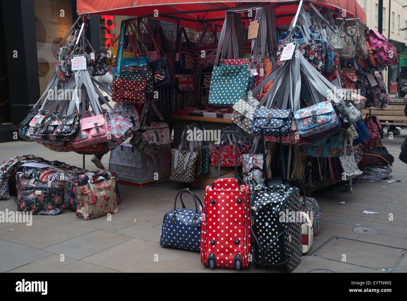 Market stall selling luggage and bags Bath Spa Somerset England UK Stock Photo