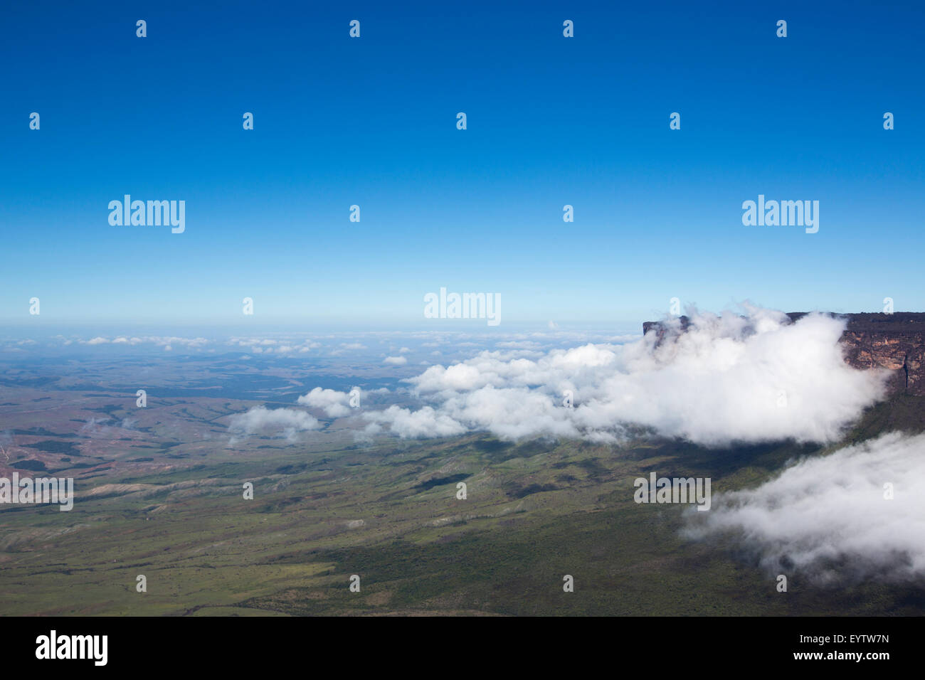Sheer cliffs of Mount Roraima - landscape with blue sky and clouds background. View on the Gran Sabana. Venezuela 2015. Stock Photo