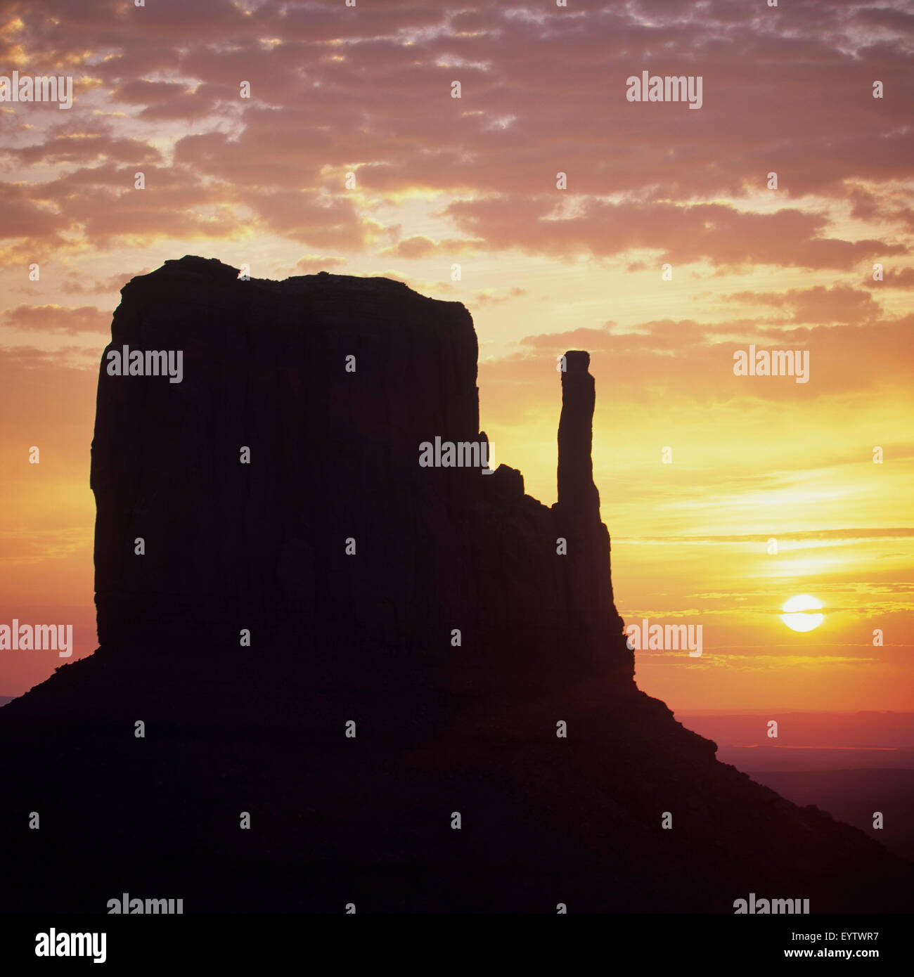 Sunrise about Left middles flounders, monument Valley Stock Photo