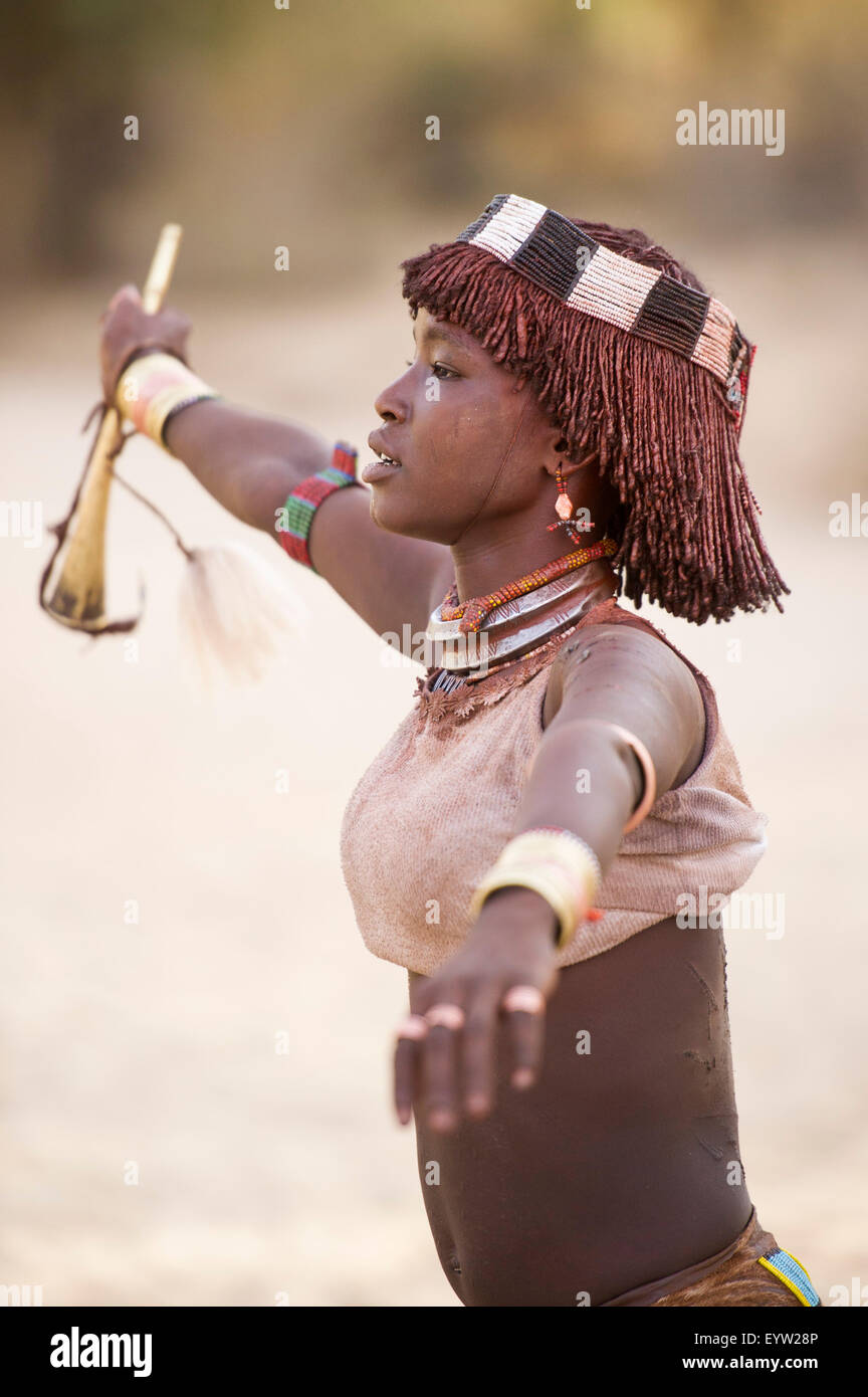 Hamer woman standing for whipping at a Hamer Bull Jumping Ceremony, Turmi, South Omo Valley, Ethiopia Stock Photo