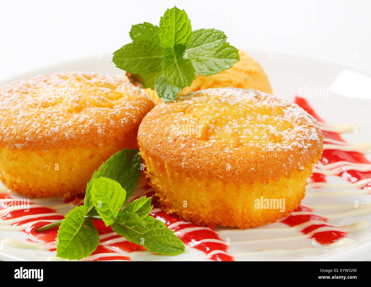 Custard filled muffins with scoop of ice cream Stock Photo Alamy