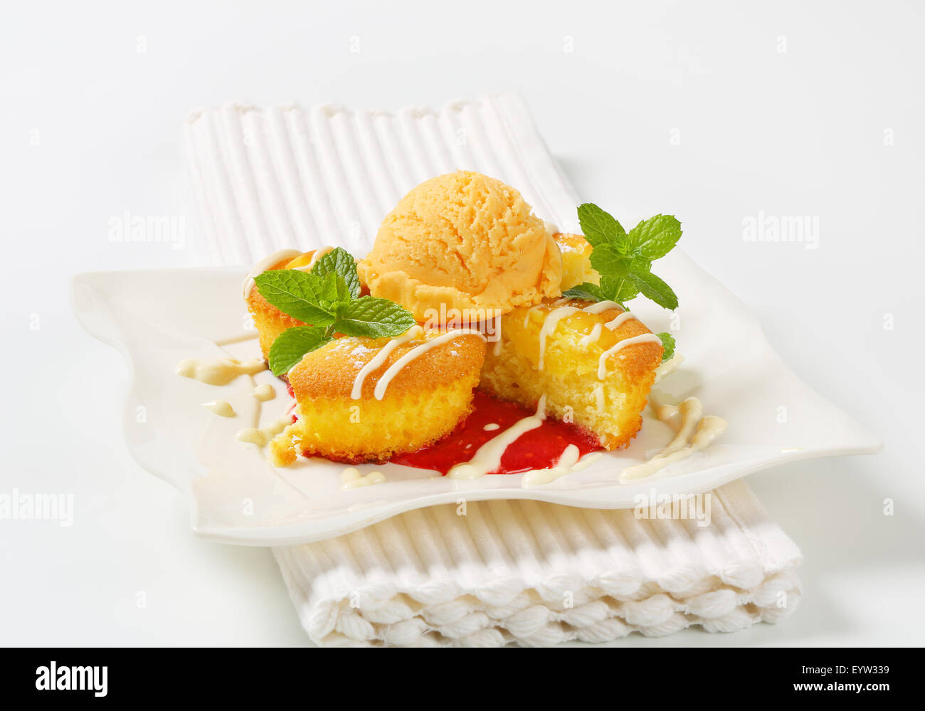 Custard filled muffins with scoop of ice cream Stock Photo Alamy