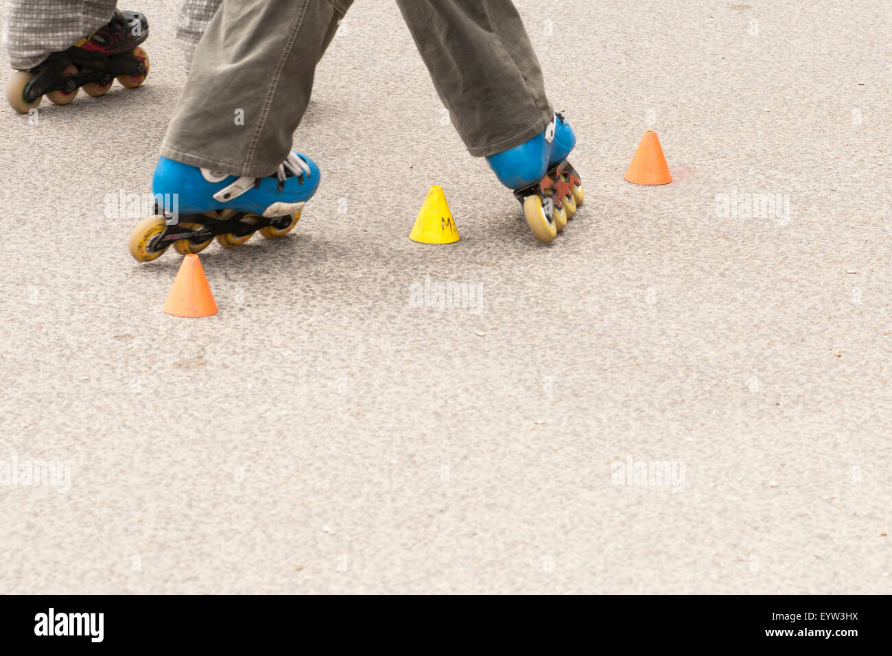 slalom with Inline skates Stock Photo Alamy