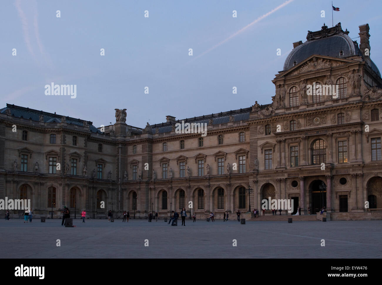 Pavillon Sully of the Louvre Palace (Palais du Louvre) at dusk. Stock Photo