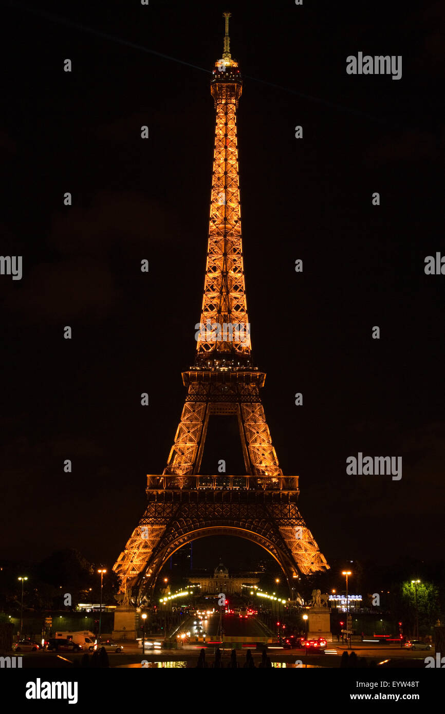 Eiffel Tower illuminated at night. Stock Photo