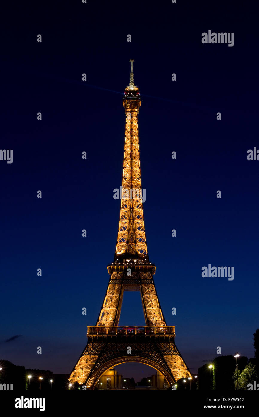 Eiffel Tower illuminated at night. Stock Photo