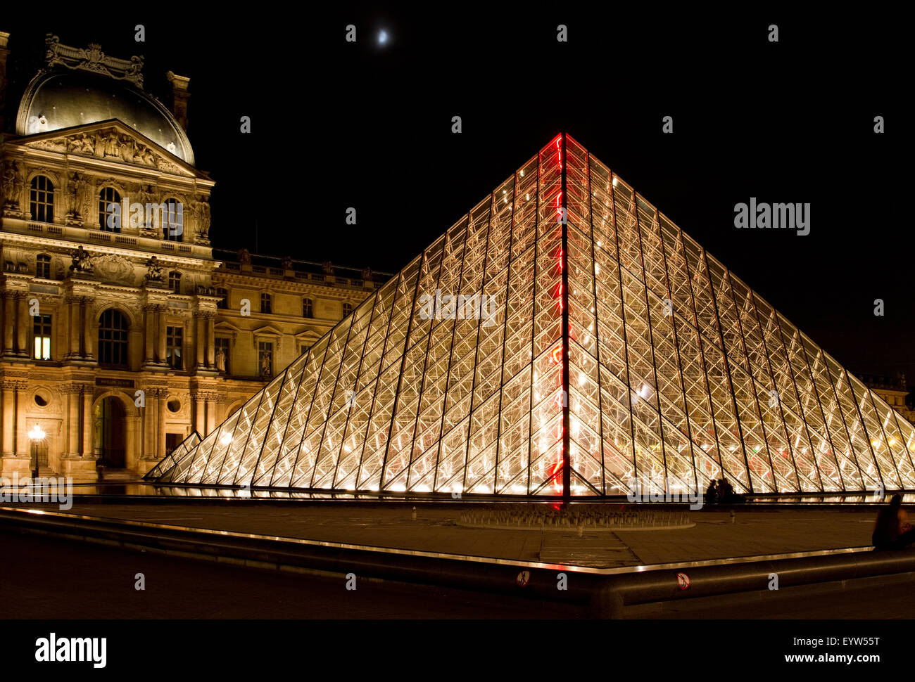 Pavillon Denon of the Louvre Palace (Palais du Louvre) and the Louvre Pyramid (Pyramide du Louvre) Stock Photo