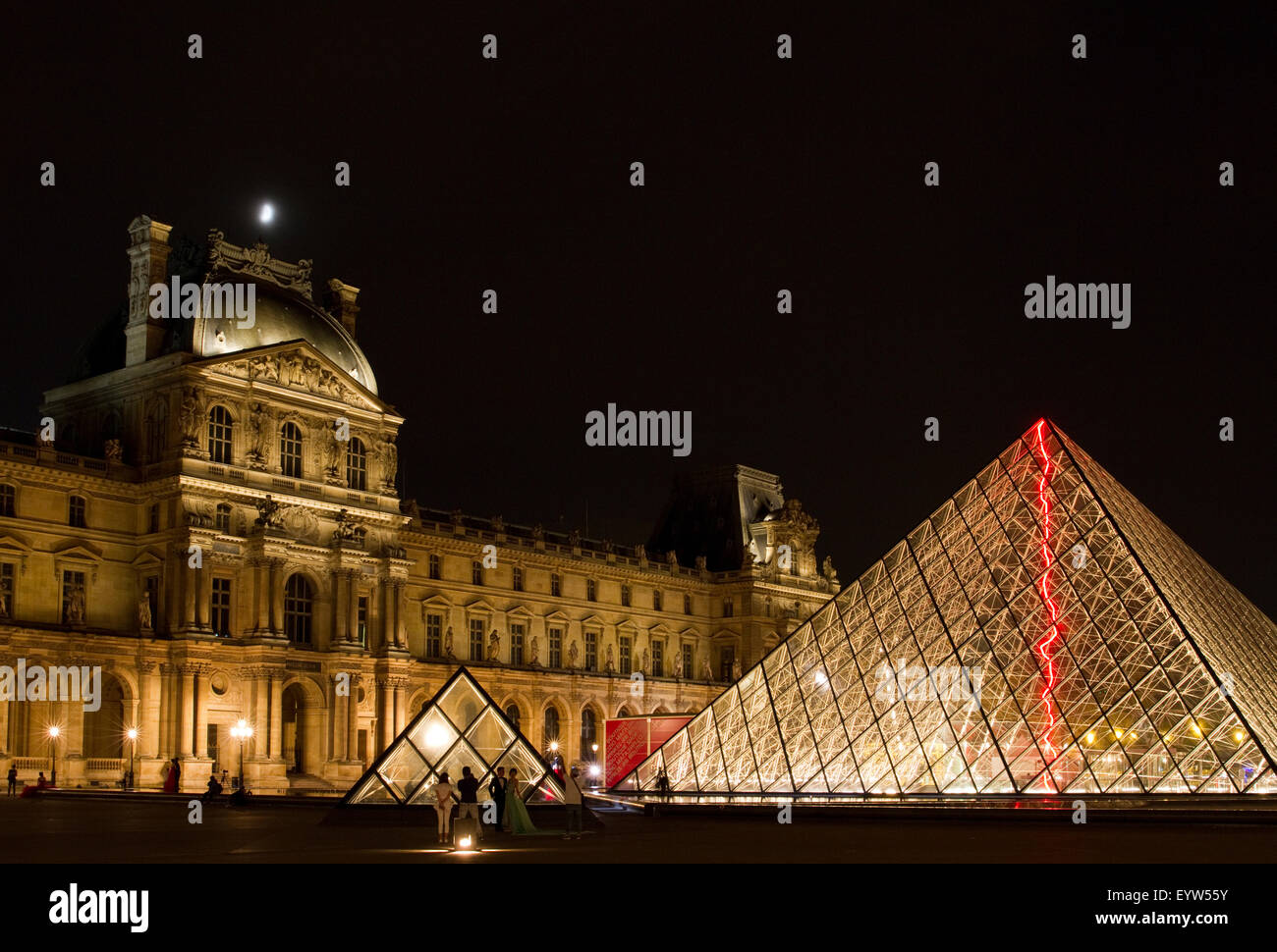 Pavillon Denon of the Louvre Palace (Palais du Louvre) and the Louvre Pyramid (Pyramide du Louvre) Stock Photo