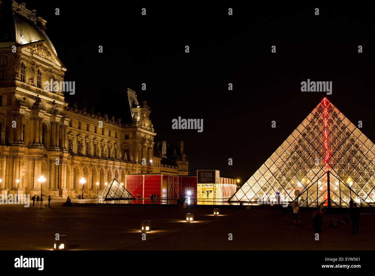 Pavillon Denon of the Louvre Palace (Palais du Louvre) and the Louvre Pyramid (Pyramide du Louvre). Stock Photo