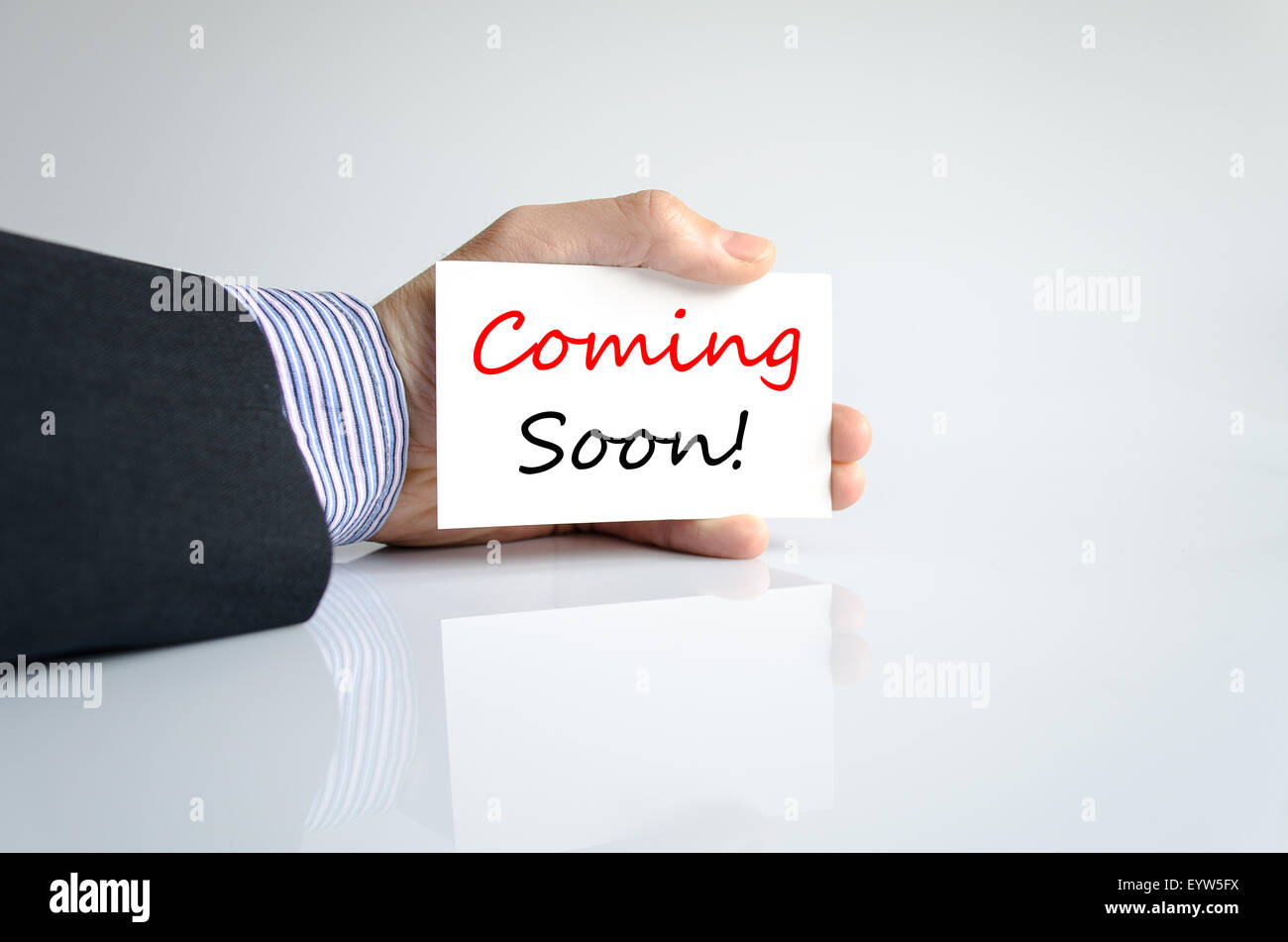 Coming soon text concept isolated over white background Stock Photo