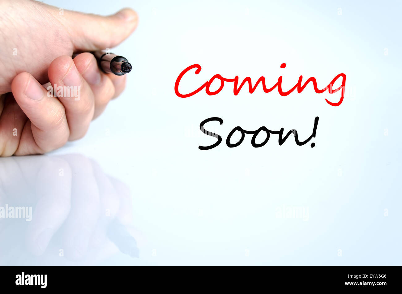 Coming soon text concept isolated over white background Stock Photo