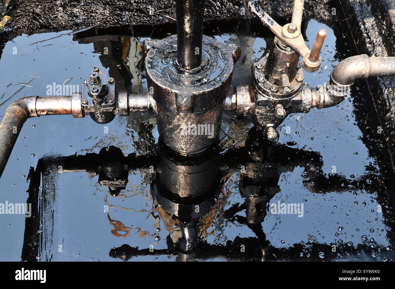 old pumpjack pumping crude oil from oil well Stock Photo Alamy