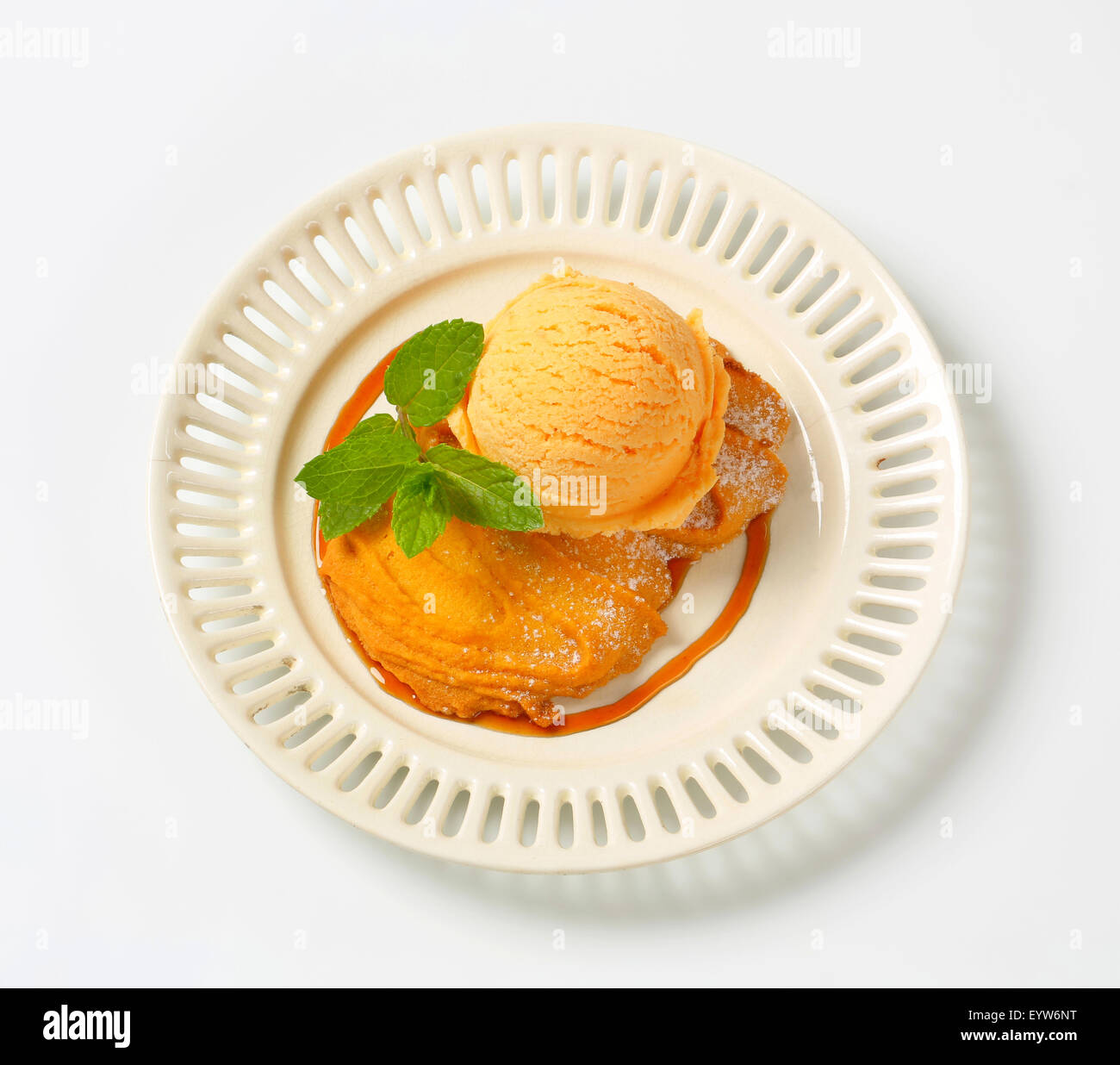 Spritz cookie with scoop of ice cream Stock Photo