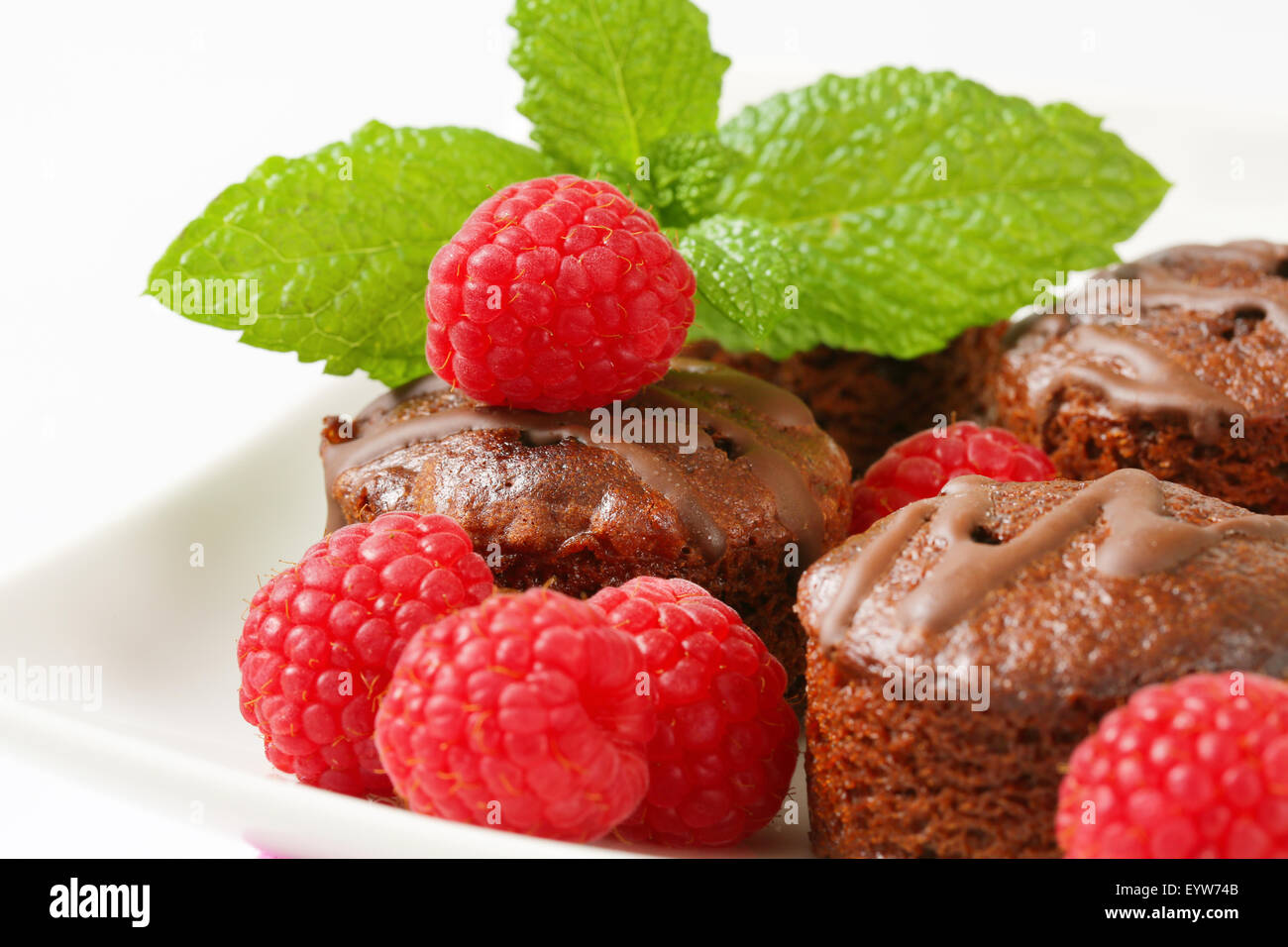 Mini chocolate cakes with raspberry filling Stock Photo