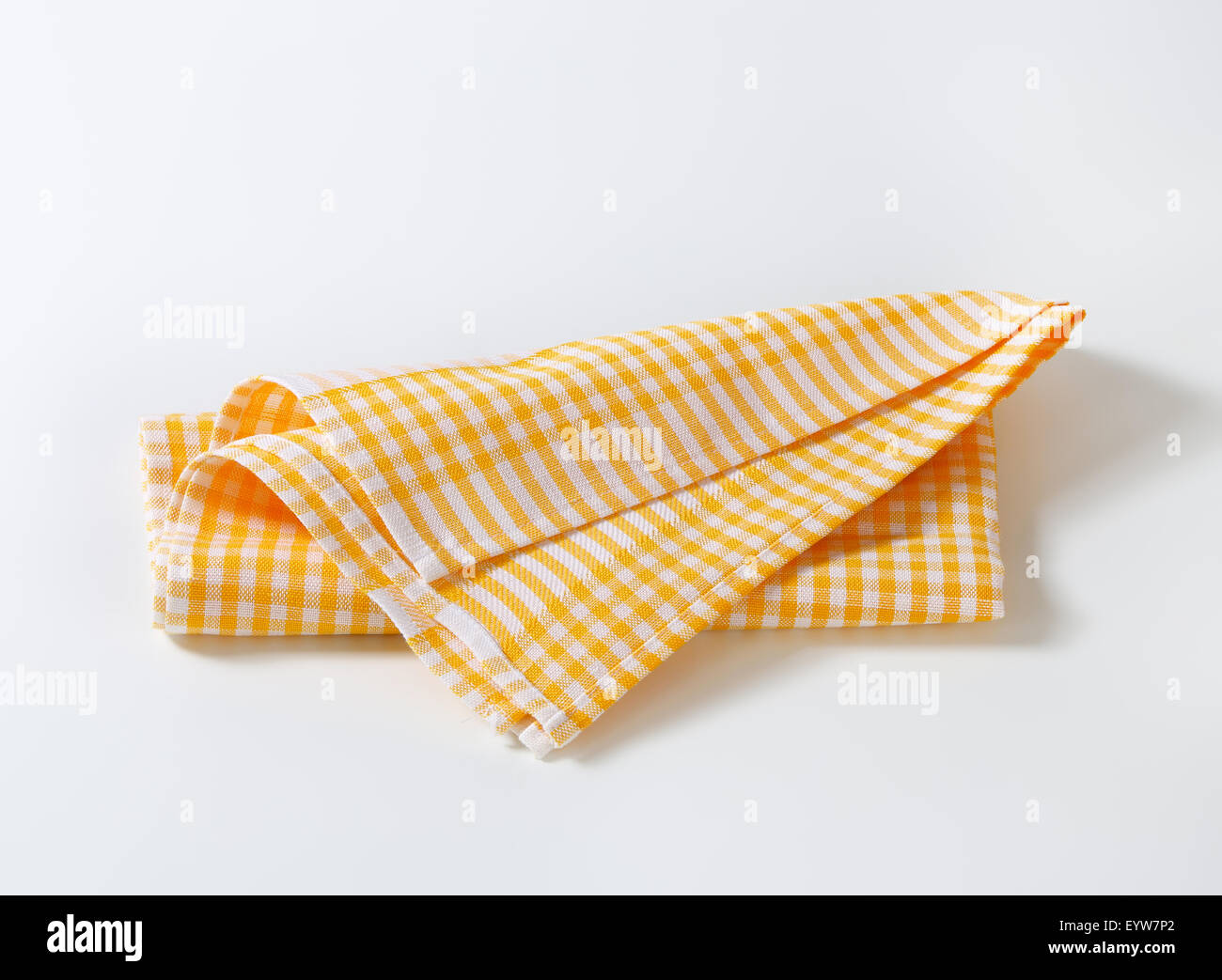 Checked yellow linen tea towel Stock Photo
