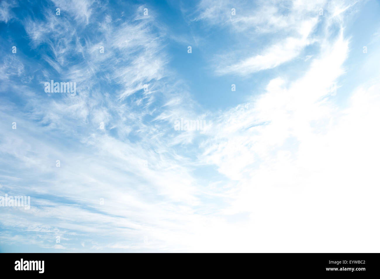 White fluffy clouds in the blue sky Stock Photo