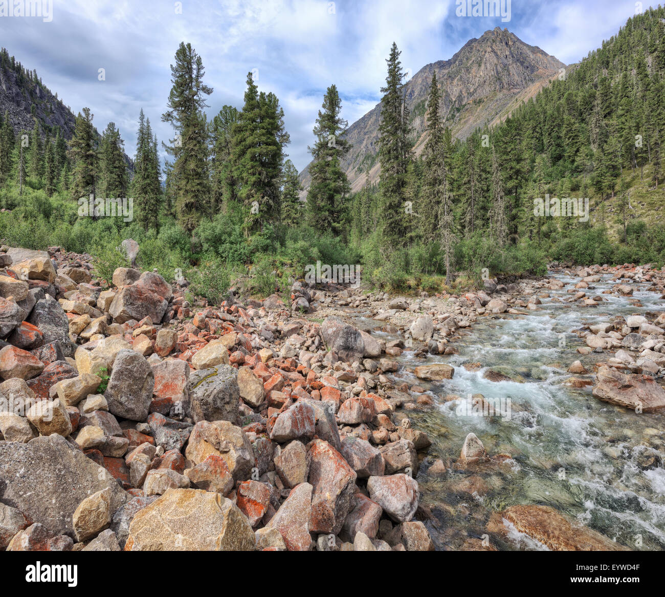 Large stones at the fast mountain river. Bilyuty River. Tunka range. Buryatia Stock Photo