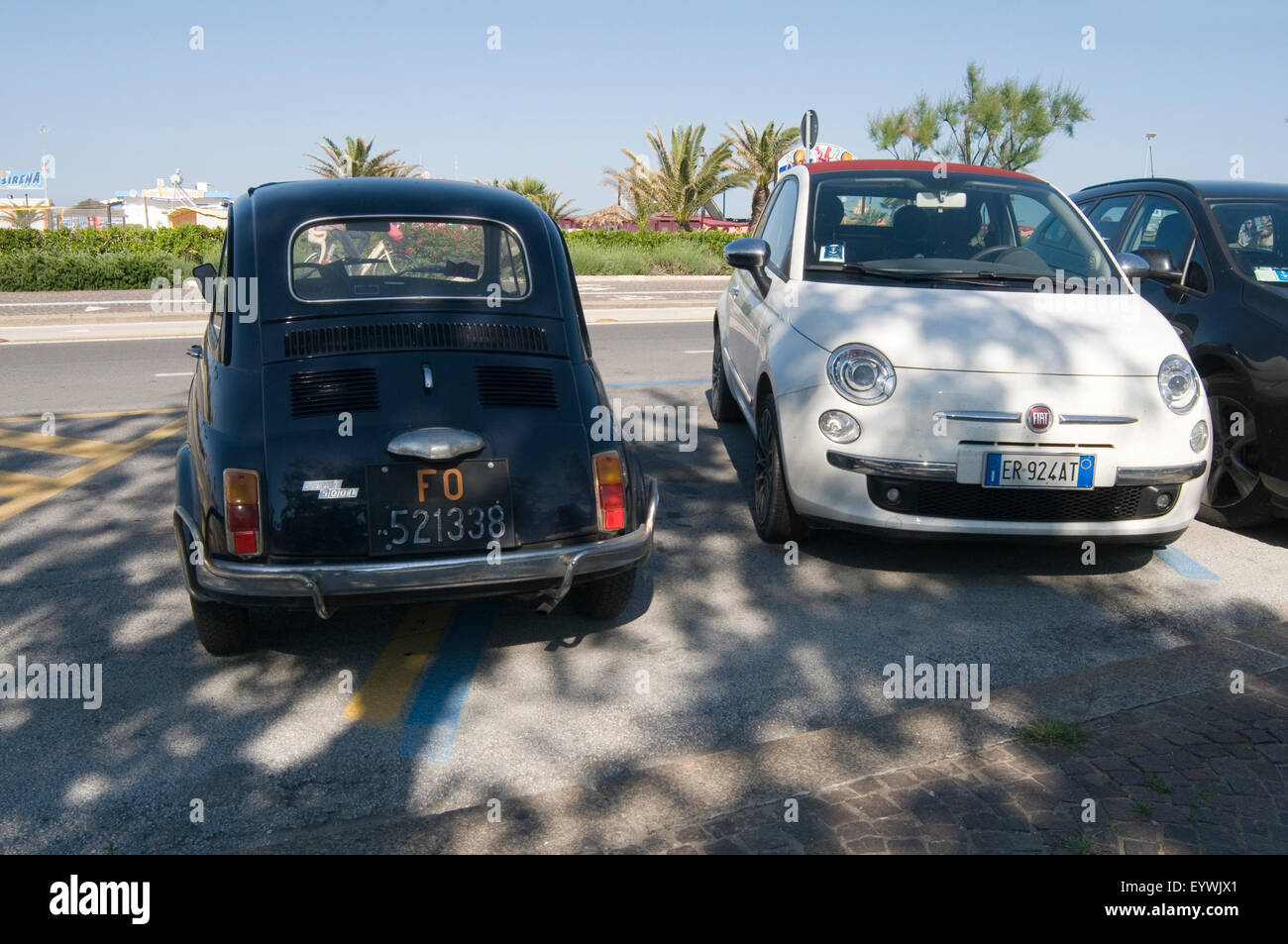 fiat 500 old new size classic modern comparison huge big bigger car cars getting tiny small city wheel wheels Stock Photo